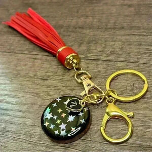 Hand Crafted Medallion Scorpio Charm and Red Tassel Gold Tone Keychain